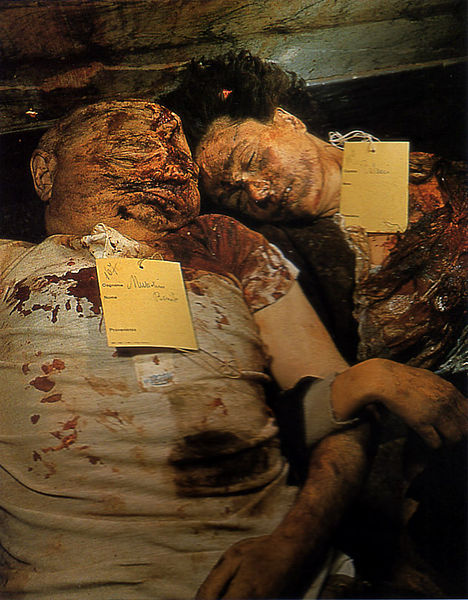 Mussolini lie beside his mistress, Clara Petacci in a morgue in Milan, Italy after execution, public display and mutilation